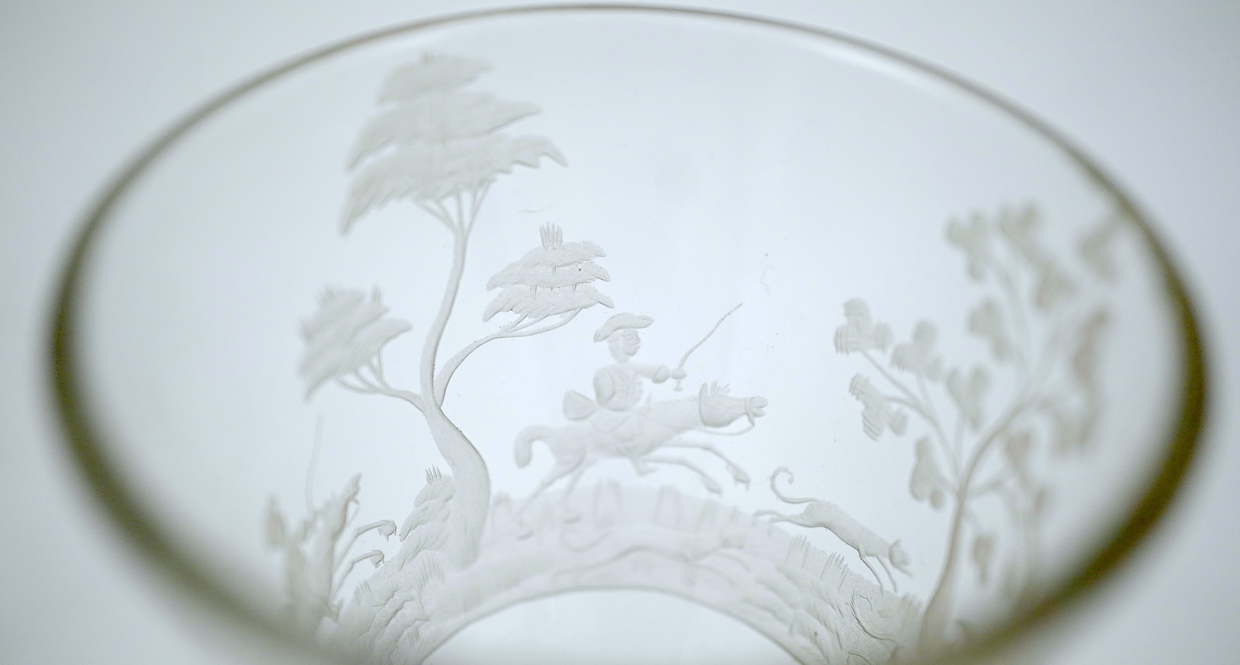 Two faceted wine glasses, engraved with hunting scenes, c.1780